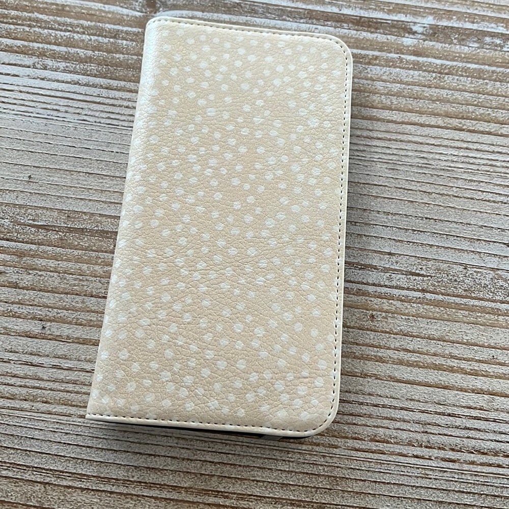 Wallet phone case. Brand new. Never used.